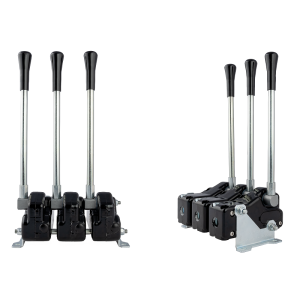 Tři páky ovládající hydraulický rozvaděč, navíc korba s montáží na základnu