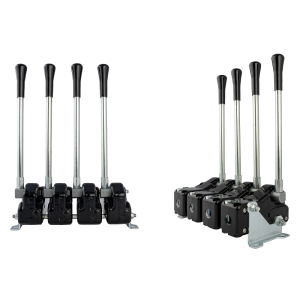 Čtyři páky ovládající hydraulický rozvaděč, navíc korba s montáží na základnu